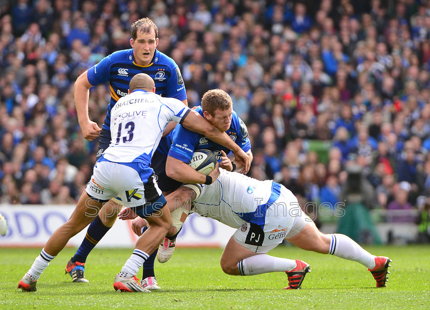 2015-04-04-Leinster-v-Bath-ERCC-0048 
 Leinsters Sean Cronin, tackled by Baths 13, Jonathan Joseph 
 Keywords: 1 Cian Healy.
Replacements: 16 Richardt Strauss, 1 Paul James.Replacements: 16 Ross Batty, 10 George Ford, 10 Jimmy Gopperth, 11 Luke Fitzgerald, 11 Matt Banahan, 12 Ian Madigan, 12 Kyle Eastmond, 13 Ben Te'o, 13 Jonathan Joseph, 14 Fergus McFadden, 14 Horacio Agulla, 17 Jack McGrath, 17 Nick Auterac, 18 Marty Moore, 18 Max Lahiff, 19 Matt Garvey, 19 Tom Denton, 2 Rob Webber, 2 Sean Cronin, 20 Alafoti Faosiliva, 20 Dominic Ryan, 21 Eoin Reddan, 21 Peter Stringer, 22 Gordon D'Arcy, 22 Sam Burgess, 23 Tom Homer., 23 Zane Kirchner.

Bath: 15 Anthony Watson, 3 Kane Palma-Newport, 3 Mike Ross, 4 Devin Toner, 4 Stuart Hooper (c), 5 Dave Attwood, 5 Mike McCarthy, 6 Carl Fearns, 6 Jordi Murphy, 7 Francois Louw, 7 Sean O'Brien, 8 Jamie Heaslip (c), 8 Leroy Houston, 9 Isaac Boss, 9 Micky Young, Leinster: 15 Rob Kearney, Rugby, Try, attack, backs, defence, flyhalf, forwards, lineout, penalty, referee, rugby ball, rugby union, scrum, scrum half, second row, tap, try line